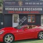 Фото красной Феррари возле входа в автосервис на вакансии Автомаляр Франция